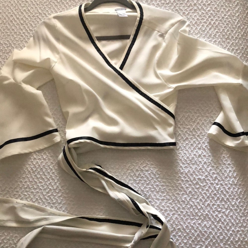 Wrap top with tie waist and bell sleeves